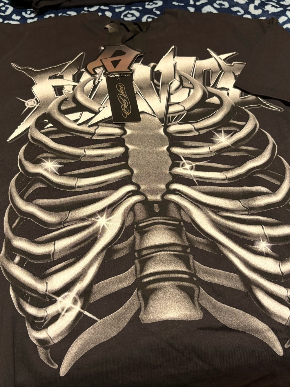 Evil vice Black Tee with Silver Ribcage Graphic